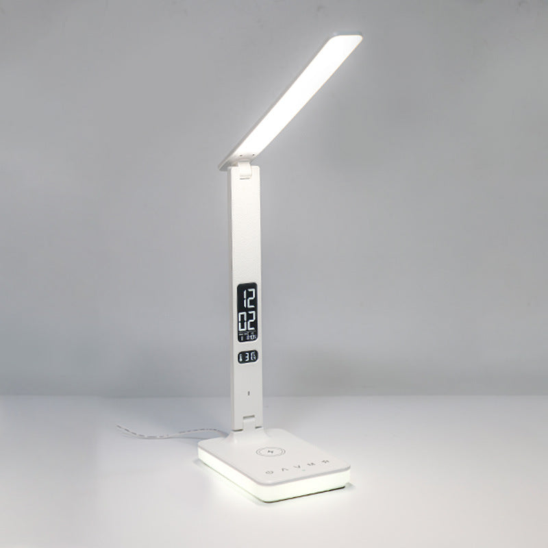 Multifunctional foldable business desk lamp with wireless charging for mobile phones