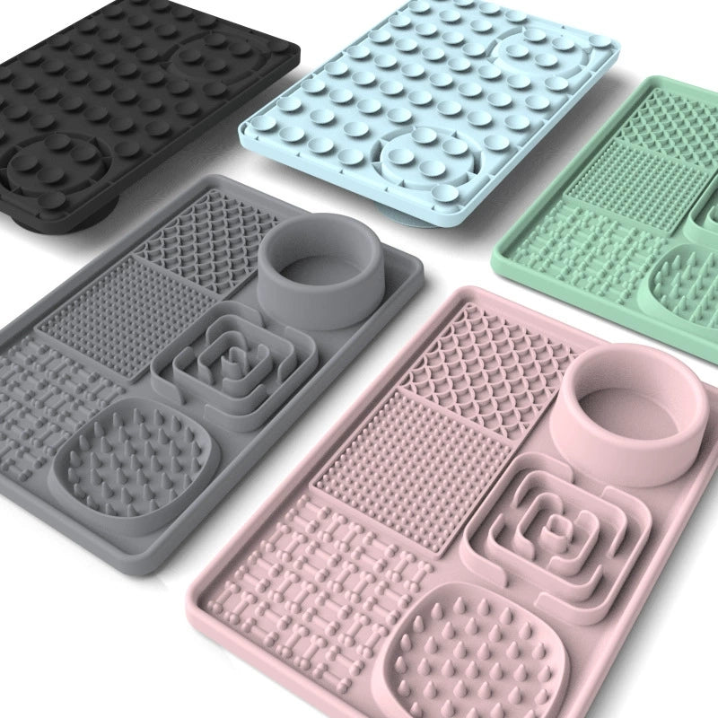 Pet cats and dogs suck on food mats
